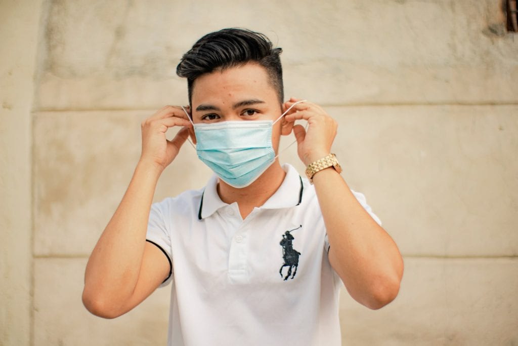 man wearing face mask creates barriers for deaf employees