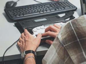 man using screen reader software