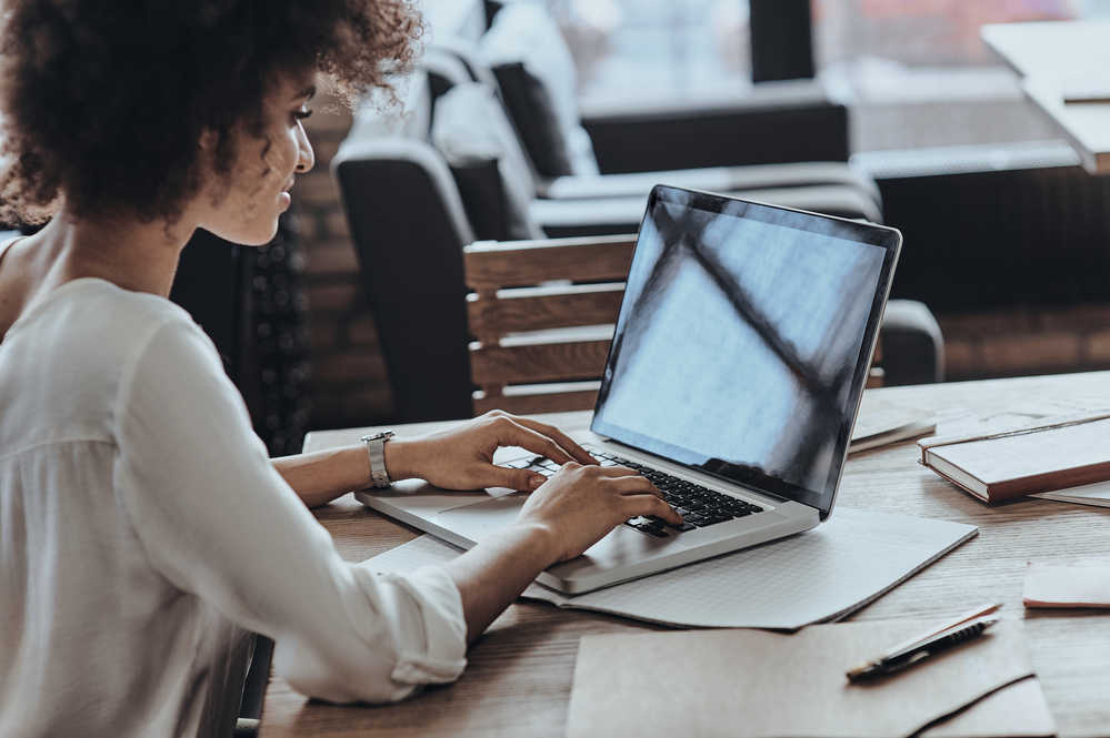 African American Woman Working Remotely