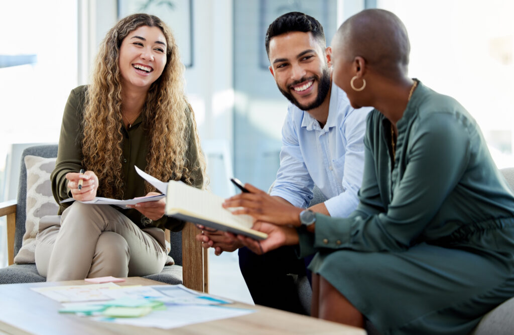 A group of coworkers talking in an office