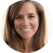 Smiling woman with blonde hair, headshot