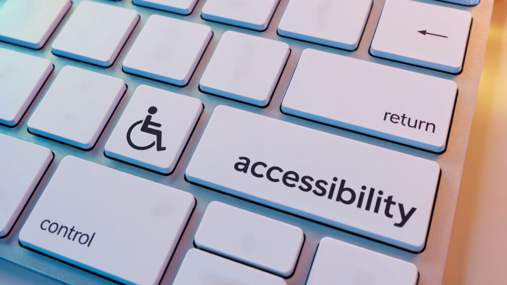 Keyboard with accessibility and wheelchair symbol, emphasizing inclusivity and universal design.